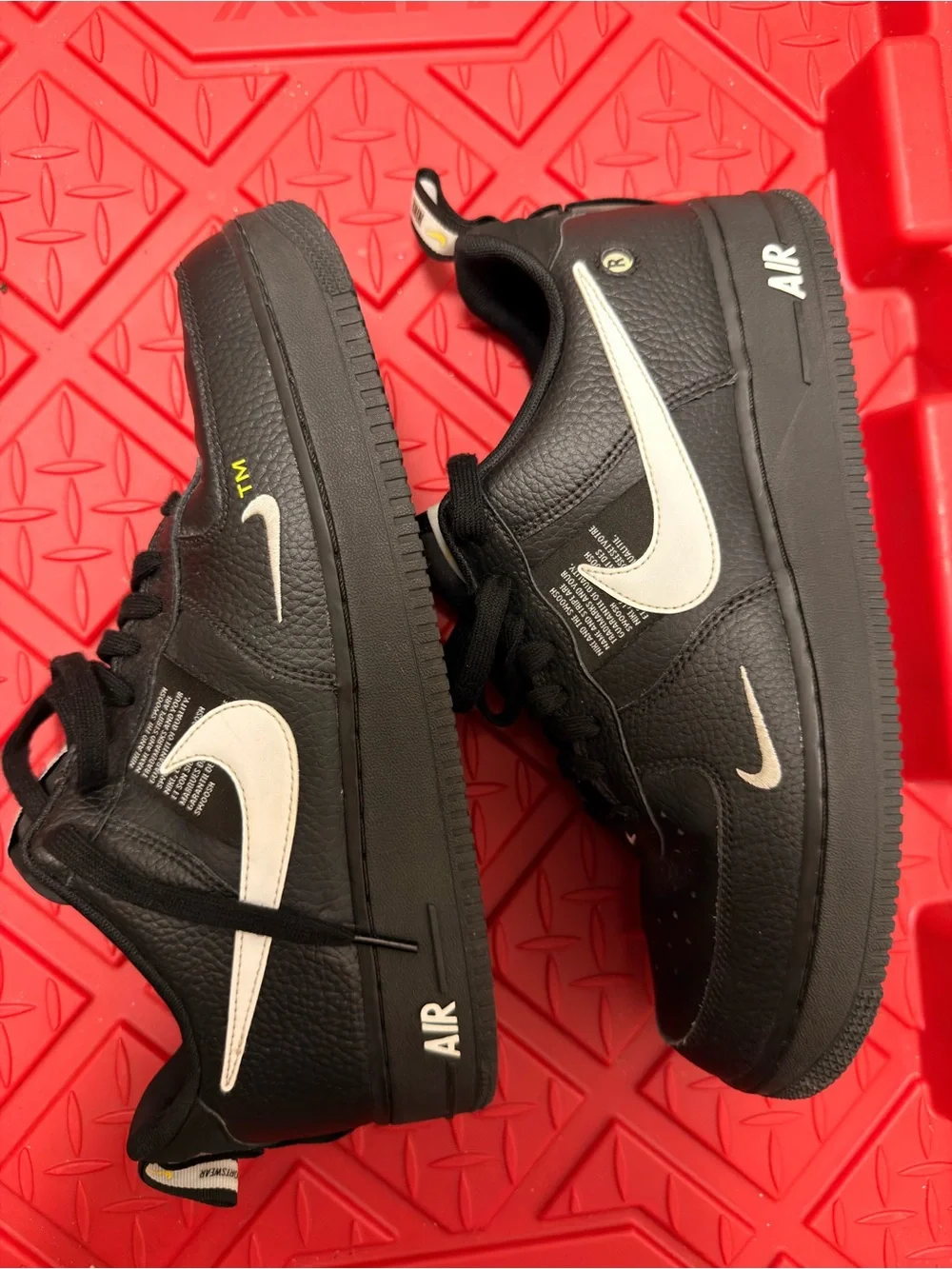 Nike Men’s Black Leather Sneakers with Pink Swoosh